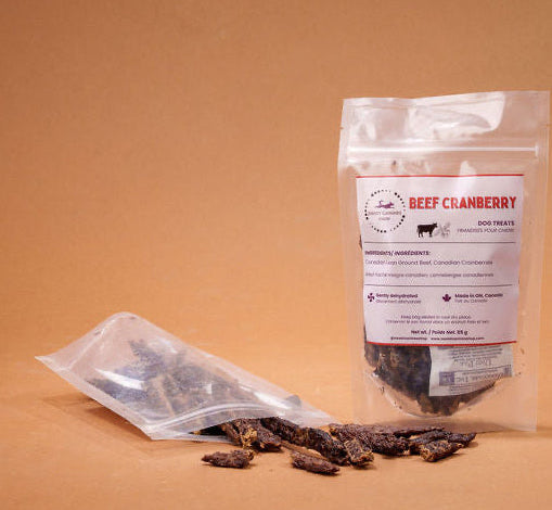 Dried cranberries with a transparent packaging bag on a brown background